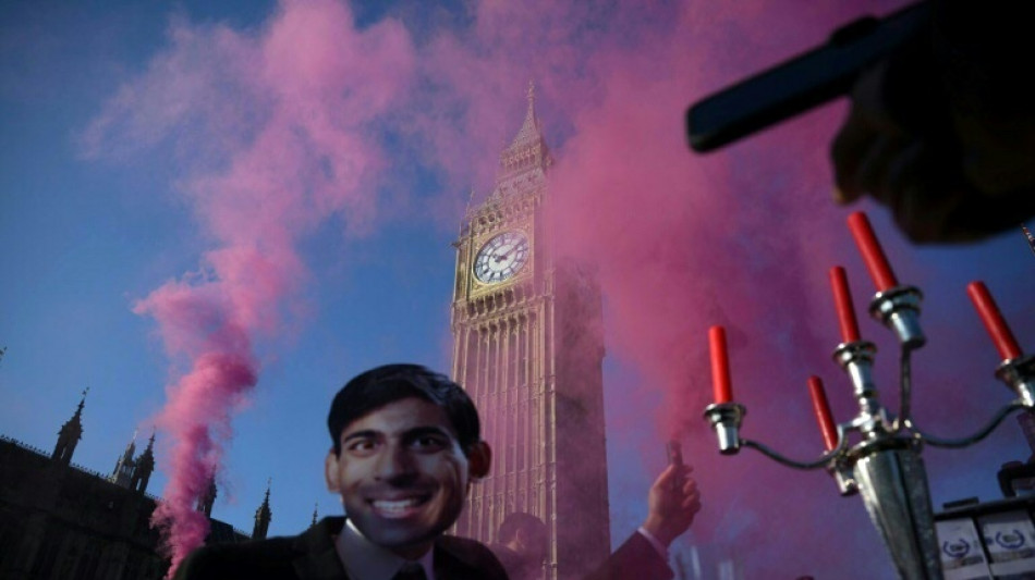 Six arrested as climate activists block road near UK parliament