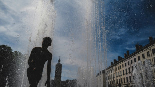 French towns sweat in record May heat