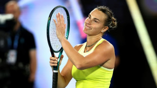 Sabalenka battles 'unbelievable' wind to keep Melbourne hat-trick alive