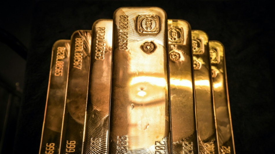 Gold tops $3,000 for first time on Trump tariff threats; stocks rebound