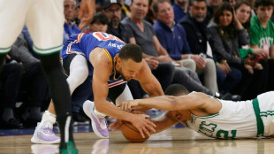 Curry sprains foot but hopes for NBA playoff return: reports