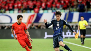 Ruthless Japan beat China to move to brink of World Cup qualification