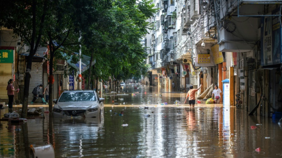 Record floods threaten southern China