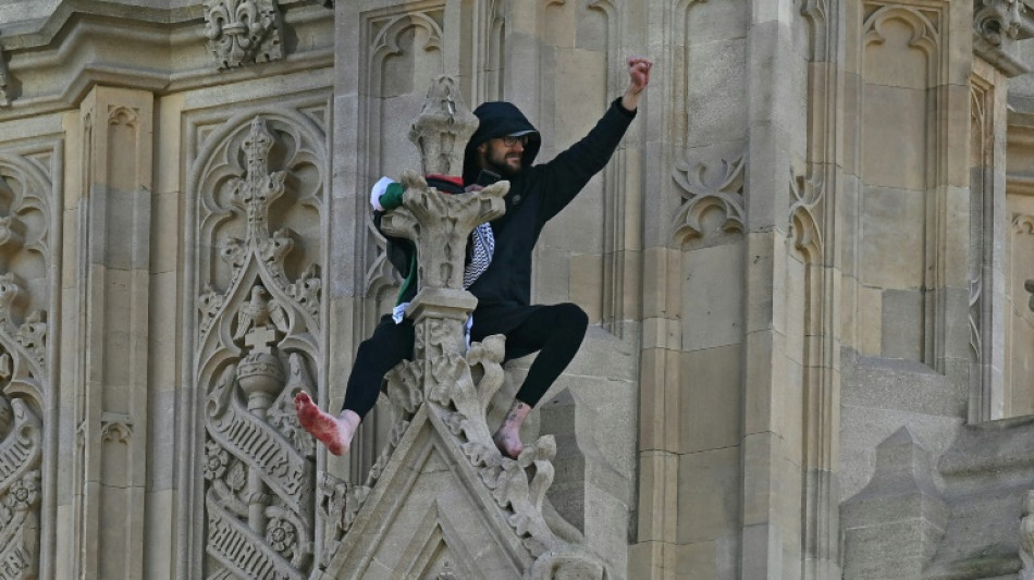 Man with Palestinian flag scales London's Big Ben clock tower