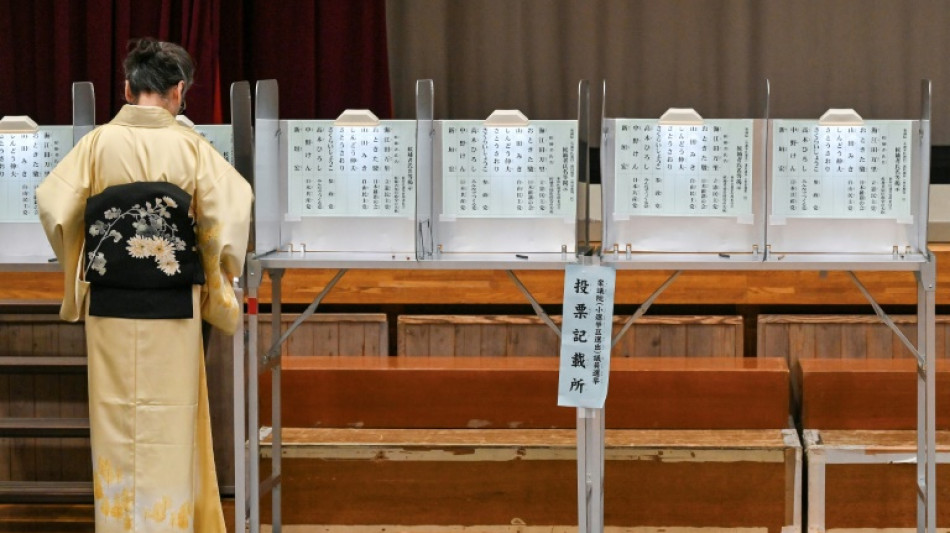 Japan voters say 'punished' ruling party over scandal