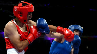 Boxeadora Imane Khelif é 'modelo' de coragem para o povo argelino