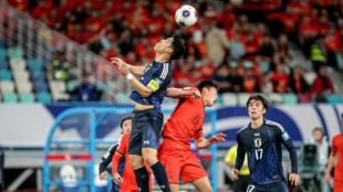 Japan on cusp of World Cup as Son scores in Palestine draw