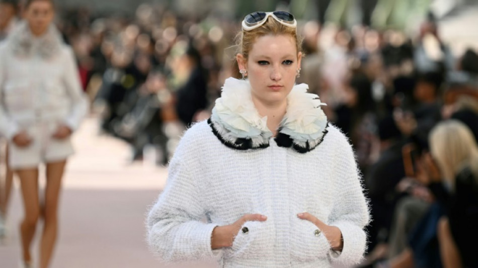 Paris fashion: Feathers fly at Chanel as Vuitton packs in stars