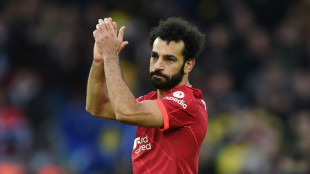 Liverpool sink Brighton to move within three points of Man City