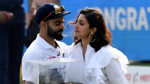 'Star number one' Kohli raises fan fever in 100th Test