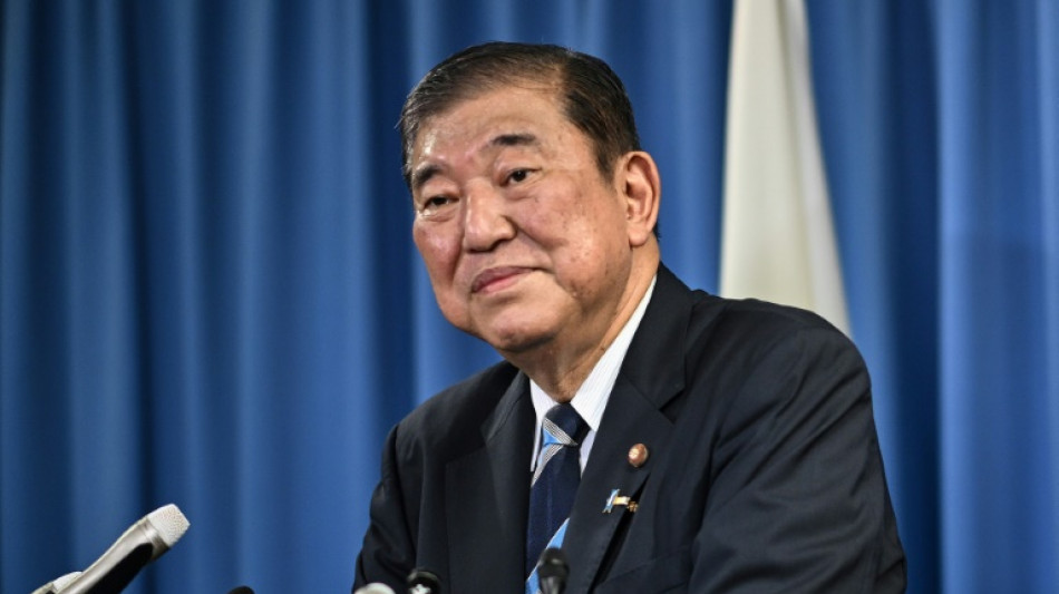 With bulging in-tray, Ishiba to become Japan PM