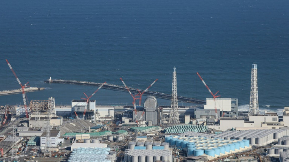 Fukushima-Arbeiter in Japan mit radioaktiv belastetem Wasser bespritzt