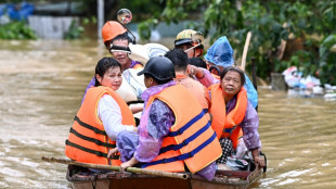 'Scared': desperate Vietnamese flee flood-hit homes