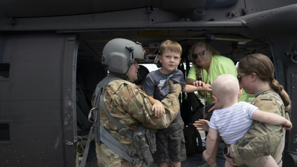 Rescuers face renewed rain as Kentucky flood death toll hits 26